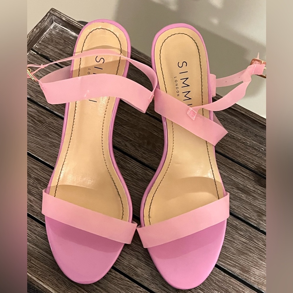 Plastic pink strap heels